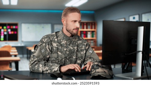 Military Student Education. Army Soldier Veteran With Computer - Powered by Shutterstock