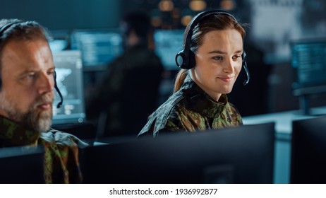 Military Surveillance Team Of Officers In Headsets Working In A Central Office Hub For Cyber Operations, Control And Monitoring For Managing National Security, Technology And Army Communications.