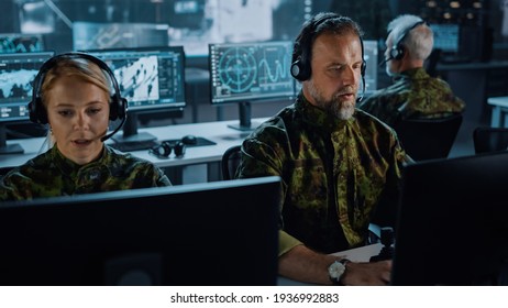 Military Surveillance Team Of Officers In Headsets Working In A Central Office Hub For Cyber Operations, Control And Monitoring For Managing National Security, Technology And Army Communications.