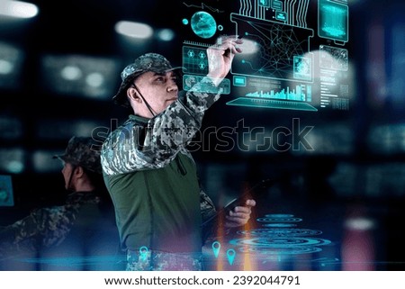 Military Think Tank, AI technology in the army. Warfare analytic operator checking coordination of the military team. Military commander with a digital device with augmented reality operating troops.