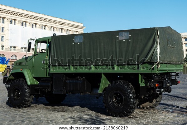 A military truck in a
khaki protective camouflage that provides transportation of goods
and military soldiers, a universal military transport. Ukrainian
Army vehicle