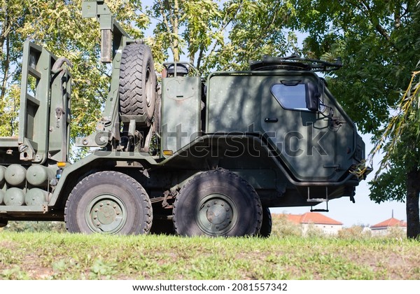 Military truck in the\
woods
