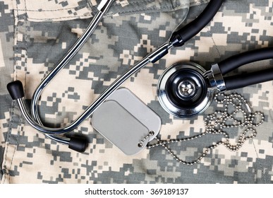 Military Uniform With Stethoscope And Identification Tags. Overhead View In Horizontal Layout.