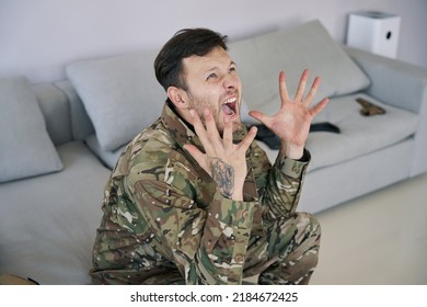 Military Veteran Suffering From PTSD And Shouting On Sofa