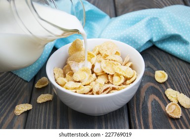 milk being poured over a bowl full of  cereal  - Powered by Shutterstock