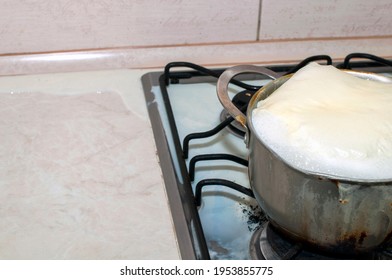 The milk boiled on the stove - Powered by Shutterstock