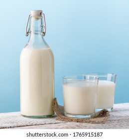 Milk. Bottle and glass with milk. - Shutterstock ID 1765915187