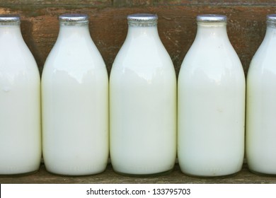 Milk Bottles On Doorstep