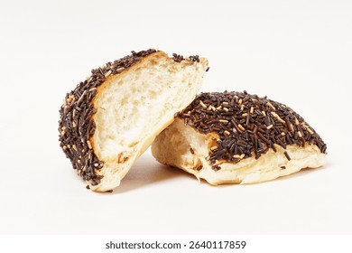 Milk bread with a soft white interior, topped generously with chocolate sprinkles and a touch of white topping. Photographed against a clean white background.