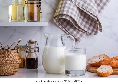 milk in a carafe on the kitchen table