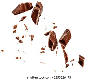  Levitating milk chocolate chunks isolated on white background. Flying Chocolate pieces, shavings and cocoa crumbs Top view. Flat lay - Shutterstock ID 2253526493
