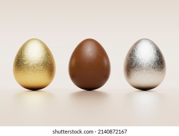 Milk Chocolate Easter Eggs With Gold And Silver Aluminium Foil On Pale Background.