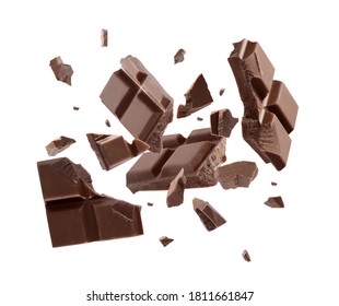 Milk chocolate pieces falling on white background - Shutterstock ID 1811661847