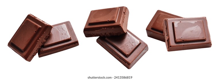 Milk chocolate pieces isolated with clipping path, no shadow in white background, cooking ingredient, homemade sweet dessert