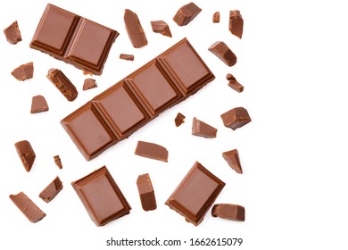 Milk Chocolate Pieces Isolated On White Background. Top View