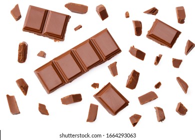 Milk Chocolate Pieces Isolated On White Background. Top View