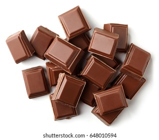 Milk Chocolate Pieces Isolated On White Background From Top View