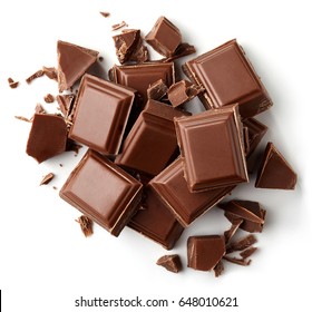 Milk Chocolate Pieces Isolated On White Background From Top View