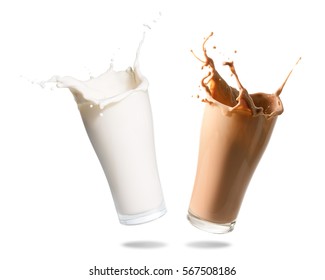 Milk and chocolate milk splashing out of glass., Isolated white background. - Powered by Shutterstock