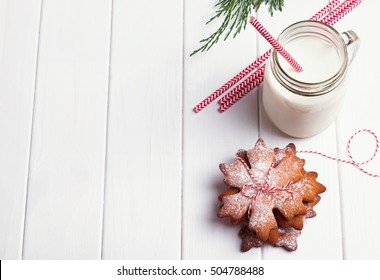 Milk and Christmas cookies on the white table - Powered by Shutterstock