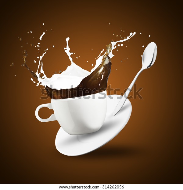 Coffee And Milk Splash From Cup — Stock Photo © Somchaij