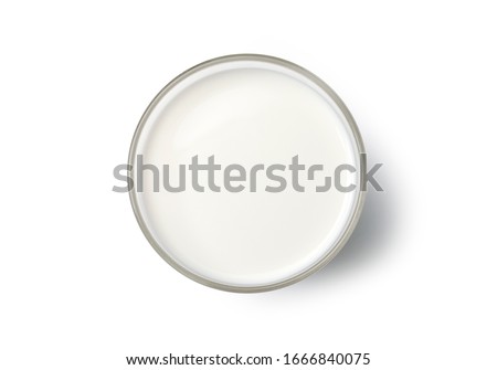 Milk in a glass top view. isolated  on white backgroud