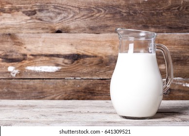 Milk In A Jar On An Old Table