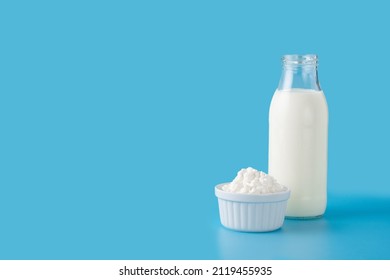Milk Kefir Drink On Blue Background.Liquid And Fermented Milk Product On Blue Background