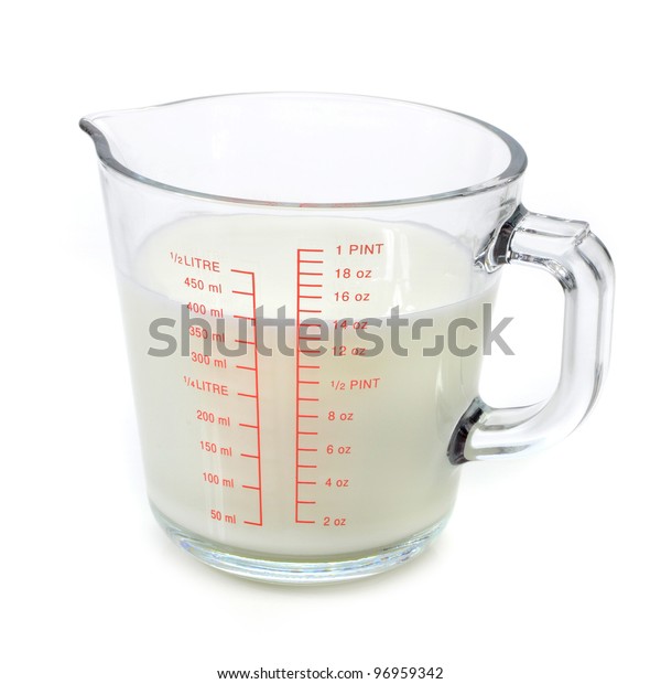 Milk Measuring Cup On White Background Stock Photo Edit Now