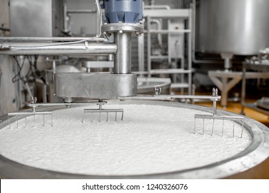 Milk Mixing In The Stainless Tank During The Fermentation Process At The Cheese Manufacturing