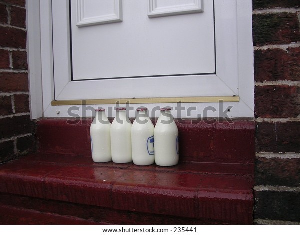 Milk On Doorstep Stock Photo (Edit Now) 235441