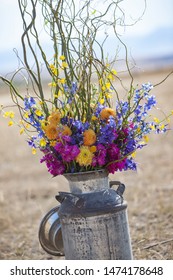 Milk Pale Of Flowers Arrangement Close Up