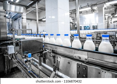 Milk production at factory - Shutterstock ID 1106870432