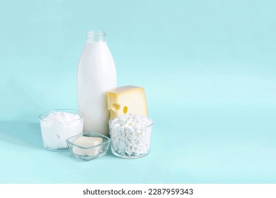 Milk and milk products on a light background - Shutterstock ID 2287959343