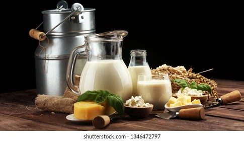 milk products. tasty healthy dairy products on a table and milk jar, glass bottle and cheese