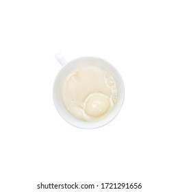 Milk Splash From A Cup Isolated On White Background, Top View