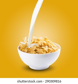 Milk Splash On Bowl Of Cereal Corn Flakes