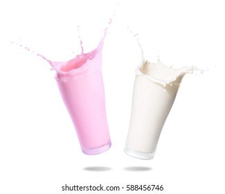 Milk and strawberry milk splashing out of glass., Isolated white background.