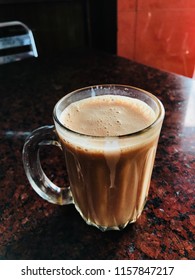 Milk Tea / Teh Tarik Is A Hot Milk Tea Beverage Which Can Be Commonly Found In Restaurants, Outdoor Stalls And Kopi Tiams Within The Southeast Asian