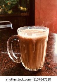 Milk Tea / Teh Tarik Is A Hot Milk Tea Beverage Which Can Be Commonly Found In Restaurants, Outdoor Stalls And Kopi Tiams Within The Southeast Asian