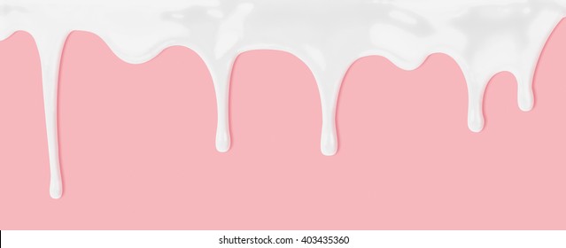 Milk Or White Liquid Dripping On Pink Background