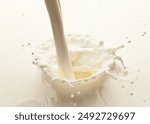 Milk or yoghurt splash from pouring dairy product close up.