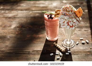 Milkshake, Banana Split And Sundae. Ice Cream Flavors With Chocolate And Strawberry Syrup And Whipped Cream.