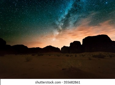 Milky Way Above Red Wadi Rum Desert In Jordan.