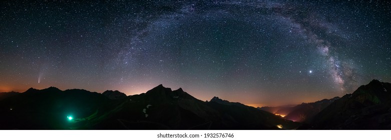 Milky Way Arc And Stars In Night Sky Over The Alps. Outstanding Comet Neowise Glowing At The Horizon On The Left. Panoramic View, Astro Photography, Stargazing.