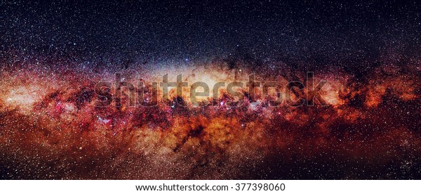 Milky Way galaxy from New Zealand. The Great\
Rift is a dark lane of dust that appears to divides the bright band\
of our galaxy lengthwise.