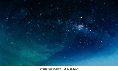 Milky Way Galaxy With Stars And Space In The Universe Background At Thailand