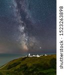 The Milky Way and Jupiter over the Anvil Point lighthouse at Durlston, near Swanage, in Dorset