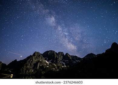 Milky way and moonlight in Posets Maladeta Nature Park, Spain. - Powered by Shutterstock