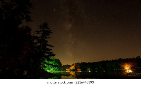 Milky Way Over A Calm Pond. High-quality Photo Shot In October When The Milky Way Is Visible Just After Sunset.